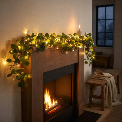 Dekoratyvinė švieselių girlianda su žalumos akcentais