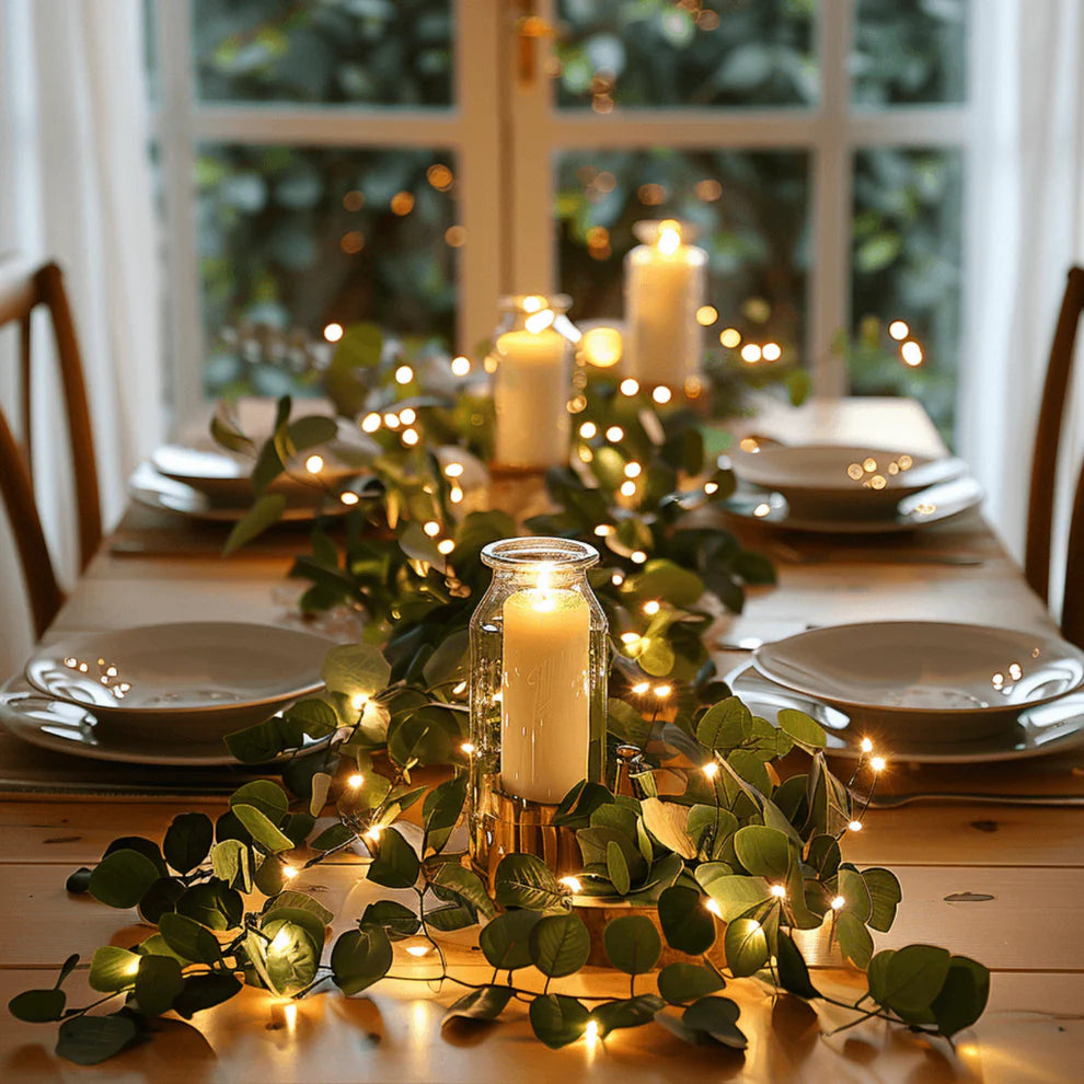 Dekoratyvinė švieselių girlianda su žalumos akcentais